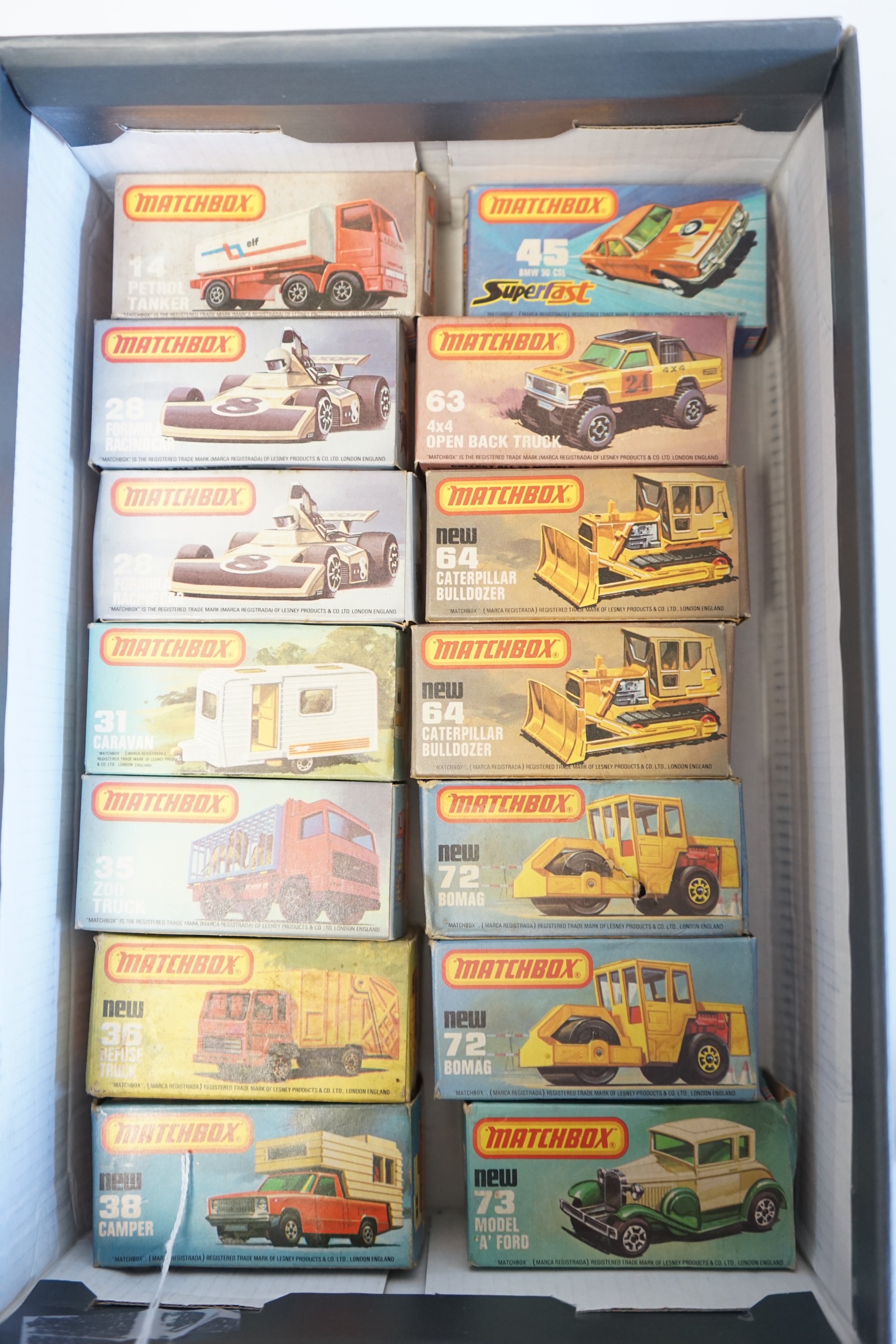 Seventeen boxed Matchbox Series 1-75 diecast vehicles including; 14; Petrol Tanker, 28; Formula Racing Car and another, 31; Caravan, 35; Zoo Truck, 36; Refuse Truck, 38; Camper, 45; BMW 30 CSL, 63; 4x4 Open Back Truck, 6